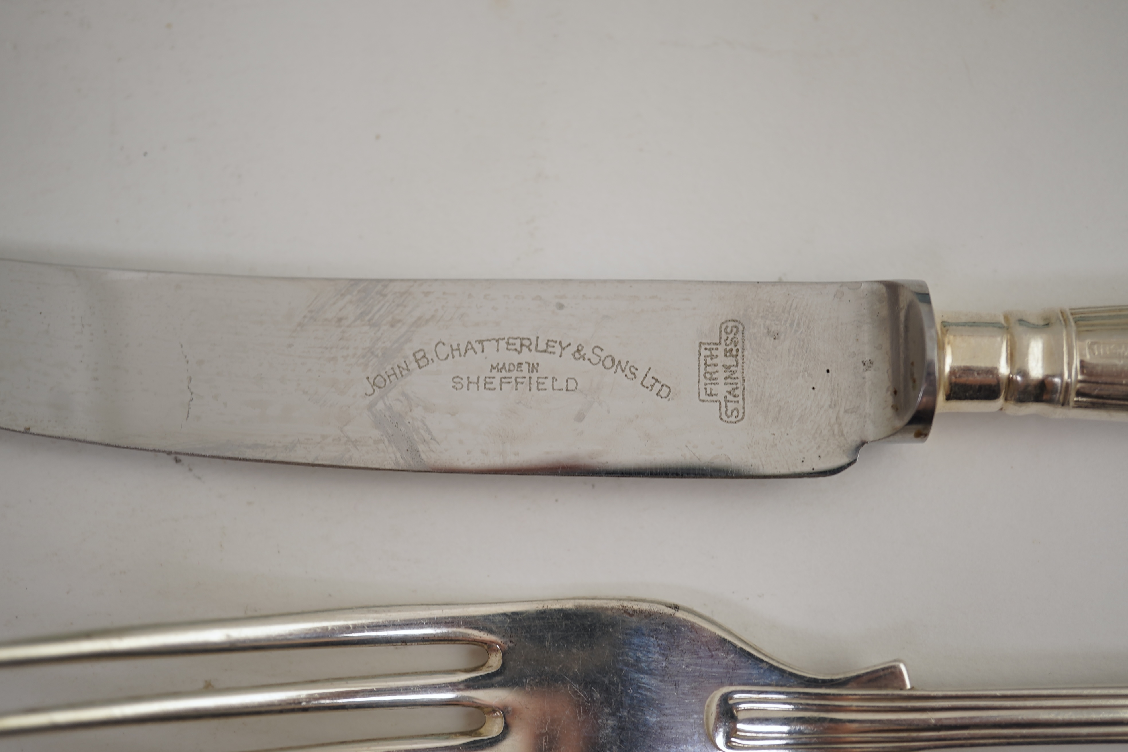 An Elizabeth II part canteen of silver fiddle, thread and shell pattern cutlery, by J B Chatterley & Sons Ltd